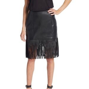 Fringe hem faux leather skirt